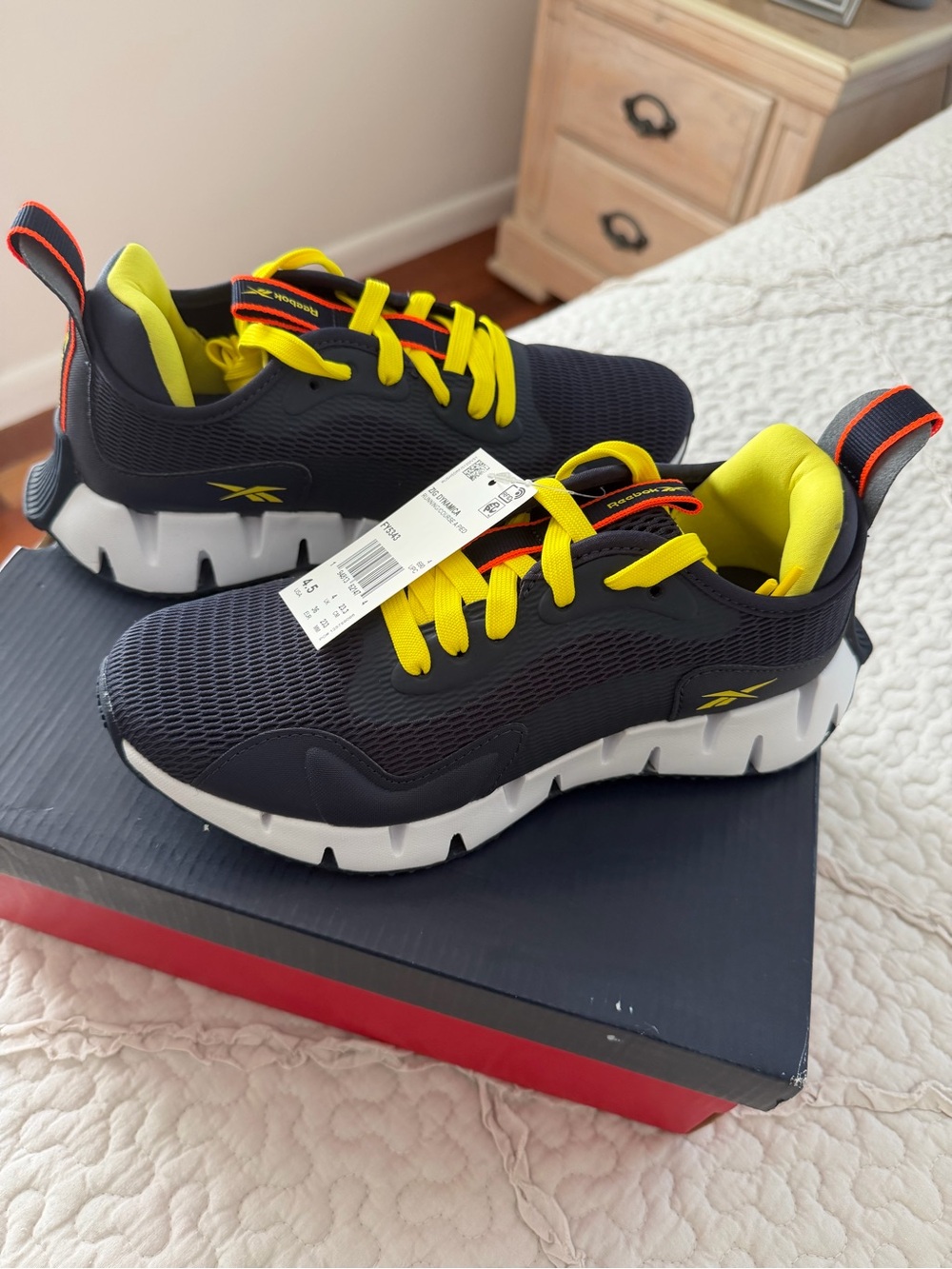 Reebok Kids Navy Sneakers with Yellow Accents and White Sole